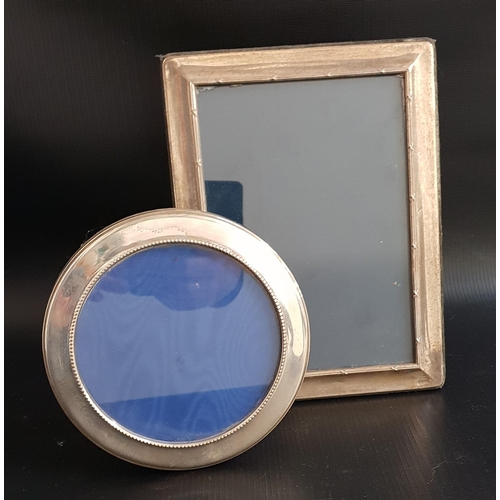 171 - TWO ELIZABETH II SILVER PHOTOGRAPH FRAMES
one with circular frame, Birmingham 1988 by W.I. Broadway ... 