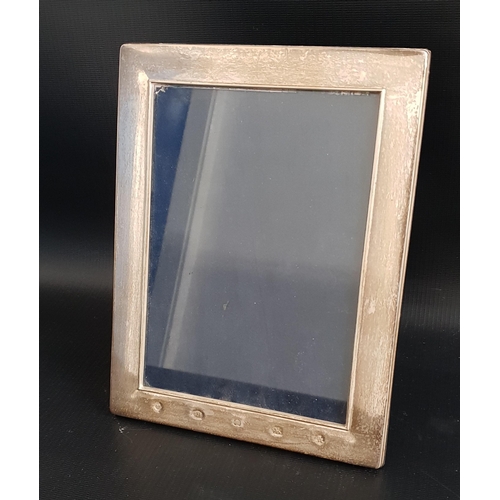 177 - RECTANGULAR SILVER PHOTOGRAPH FRAME
with decorative Millennium hallmarks, Sheffield 2000 by Carr's, ... 