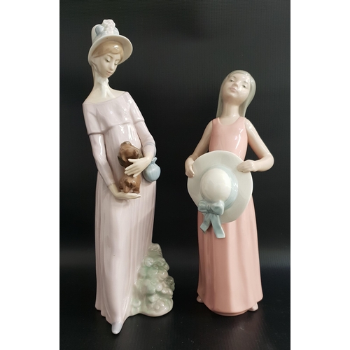 229 - TWO LLADRO FIGURINES
comprising The Dreamer, 5008, 25cm high and My Little Pet, 4994, 29.5cm high (2... 