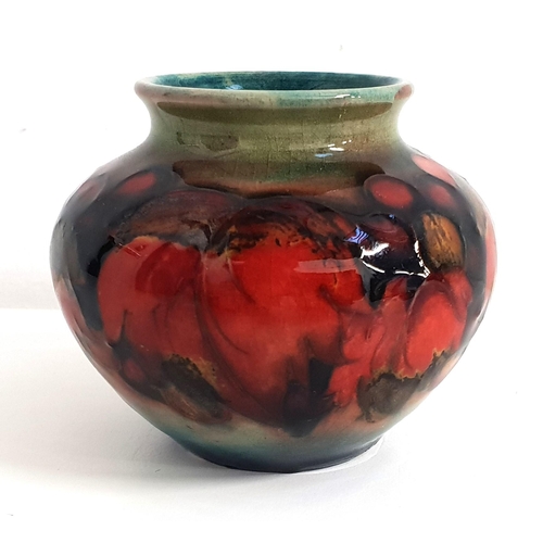 246 - WILLIAM MOORCROFT POMEGRANITE VASE
of squat ovoid baluster form, with impressed mark and underglaze ... 