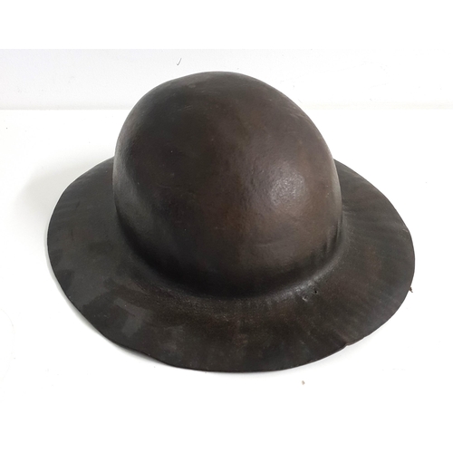 18th CENTURY LEATHER MINERS HELMET/TULL
of one piece construction