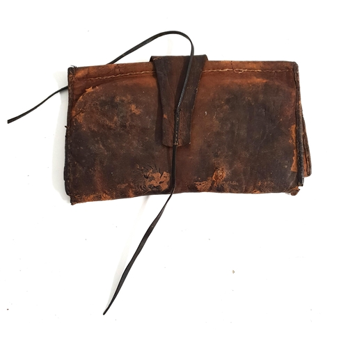 342 - MID 19th CENTURY LEATHER WALLET
of fold over design with two internal pockets with button closure an... 