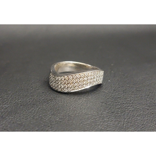 EIGHTEEN CARAT WHITE GOLD DIAMOND RING
the stylised band in a wave motif, half of which is set with four rows of diamonds, approximately 7.5 grams, ring size Q