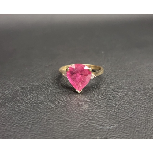 58 - RUBY AND DIAMOND RING
the central pear cut ruby measuring approximately 10.5mm x 9.7mm x 3.5mm, flan... 