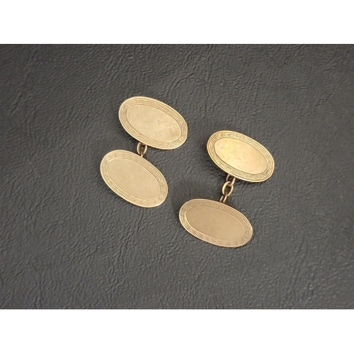 PAIR OF NINE CARAT GOLD CUFFLINKS
the oval faces with wavy edge decoration, total weight approximately 5.9 grams
