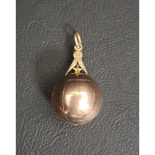 78 - UNUSUAL VICTORIAN NINE CARAT GOLD MASONIC BALL FOB
the outer globe ball surmounted by a star and com... 