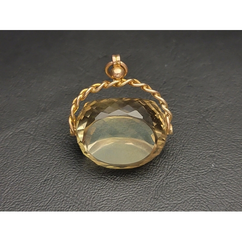 85 - VERY LARGE CITRINE SWIVEL FOB
on nine carat gold mount, the gemstone approximately 3cm wide, total w... 