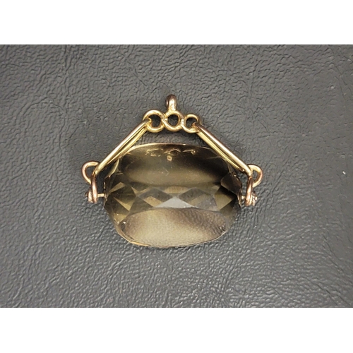 92 - LARGE CITRINE SWIVEL FOB
on nine carat gold mount, the gemstone approximately 2.7cm wide, total weig... 