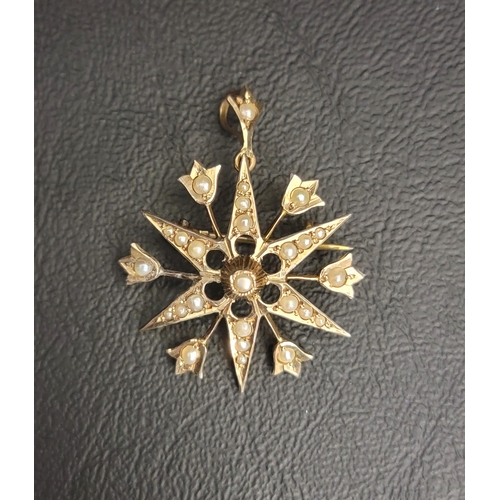 103 - EDWARDIAN SEED PEARL SET STARBURST BROOCH/PENDANT
in nine crat gold, 2.9cm wide and approximately 3 ... 