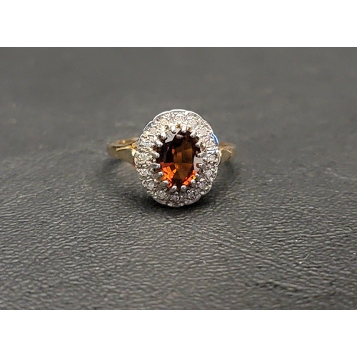 63 - CITRINE AND DIAMOND CLUSTER RING
the central oval cut citrine approximately 1ct in a sixteen diamond... 