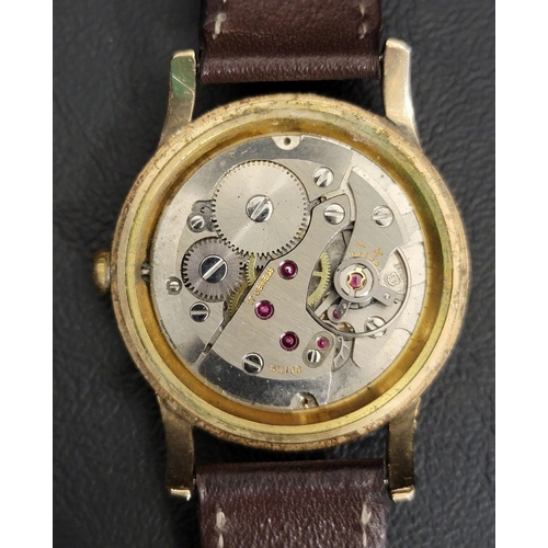 119 - GENTLEMAN'S BAUME NINE CARAT GOLD CASED WRISTWATCH
the dial with gilt Arabic numerals and subsidiary... 