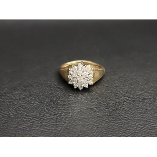 83 - DIAMOND CLUSTER RING
in nine carat gold, the diamonds totalling approximately 0.5cts in stepped sett... 