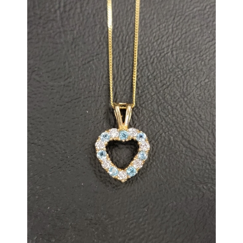 98 - AQUAMARINE AND CZ HEART PENDANT
in nine crat gold and on nine carat gold chain