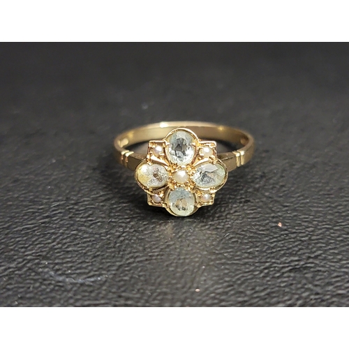 115 - AQUAMARINE AND SEED PEARL CLUSTER RING
in nine carat gold, ring size O and approximately 2.1 grams