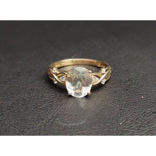 65 - AQUAMARINE AND WHITE SAPPHIRE DRESS RING
the central oval cut aquamarine approximately 2cts flanked ... 