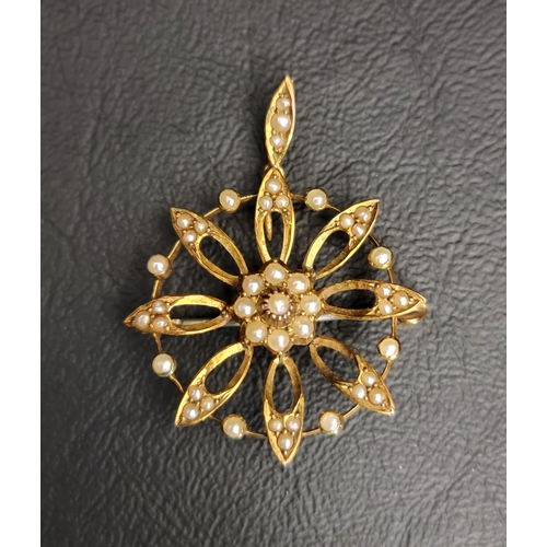 72 - EDWARDIAN SEED PEARL SET BROOCH/PENDANT
in nine carat gold, 3cm wide and approximately 3.6 grams