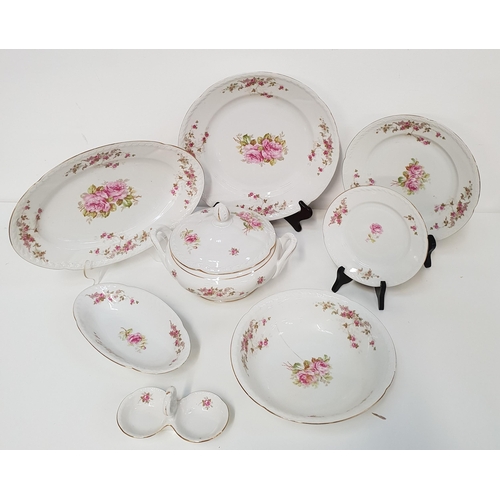 224 - CZECHOSLOVAKIAN PART DINNER SERVICE
the white ground with rose decoration and gilt highlights, compr... 