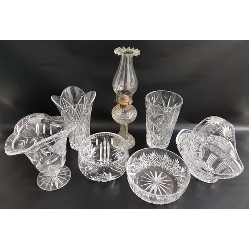 MIXED LOT OF GLASSWARE
including an oil lamp, two circular centre bowls, three shaped tapering vases and a basket
