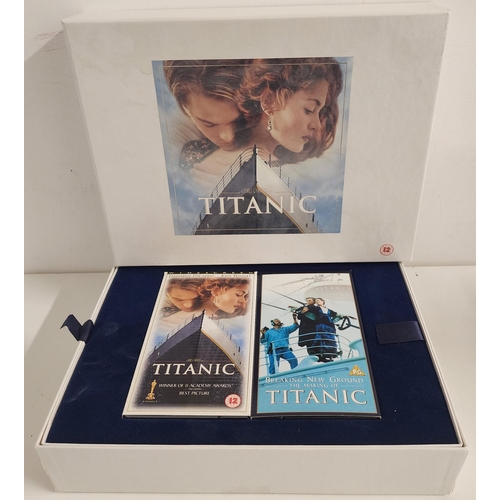 THE WIDESCREEN COLLECTOR'S EDITION OF TITANIC
box set comprising the video of the film, unused, the making of Titanic video, full length script, original theatrical production notes, 35mm film cell and collectors cards
