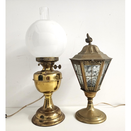 DUPLEX BRASS OIL LAMP
now converted to electricity, 51cm high, together with a brass electric hexagonal lamp with opaque glass panels and a circular base, 39cm high (2)