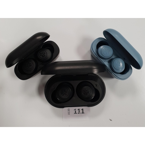 THREE PAIRS OF JLAB EARBUDS IN CHARGING CASES