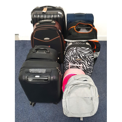 62 - SELECTION OF EIGHT SUITCASES, A RUCK SACK AND A CHILD'S CASE
including Mayfair, Sovereign, Fila, and... 