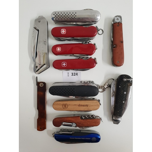 SELECTION OF TWELVE SWISS ARMY KNIVES AND MULTI TOOLS
of various sizes and designs
Note: You must be over the age of 18 to bid on this lot.