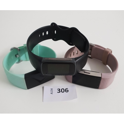 SELECTION OF THREE FITBITS
comprising a Charge 5, a Charge 4 and a Charge 2