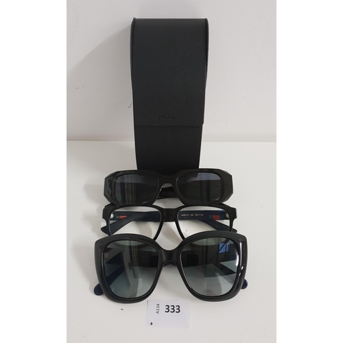 333 - TWO PAIRS OF DESIGNER SUNGLASSES AND ONE PAIR OF GLASSES
comprising Gucci and Prada sunglasses (Prad... 