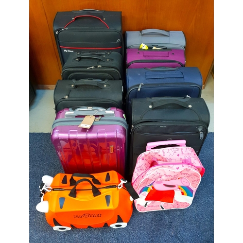 SELECTION OF TEN SUITCASES 
including Trunki, Sky Travel, Swiss Gear, and Aerolite,  etc.
Note: all cases and bags are empty