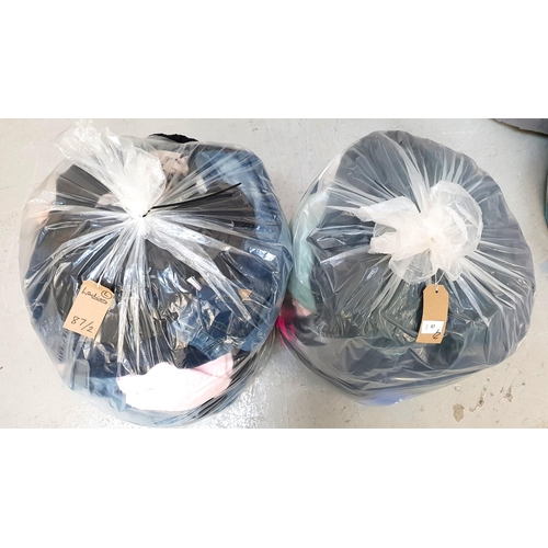 87 - TWO BAGS OF LADIES CLOTHING ITEMS
including New Look, Nike, Pull & Bear, Zara, Whistles and Top Shop