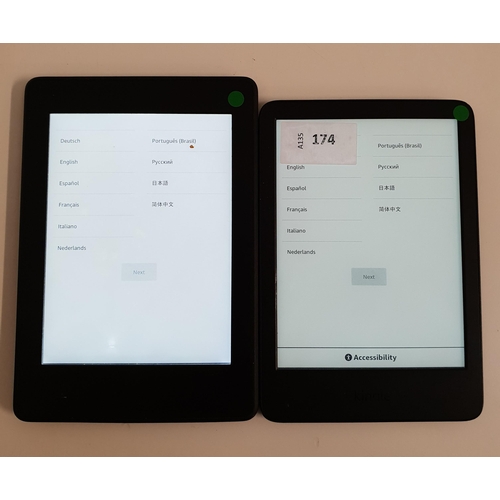 174 - TWO AMAZON KINDLE PAPERWHITE E-READERS
comprising a Paperwhite 4 serial number G092 AP03 2322 00LU a... 