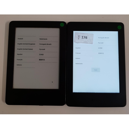 176 - TWO AMAZON KINDLE PAPERWHITE E-READERS
comprising a Paperwhite 3 serial number G0G0 G105 5295 OCN1 a... 