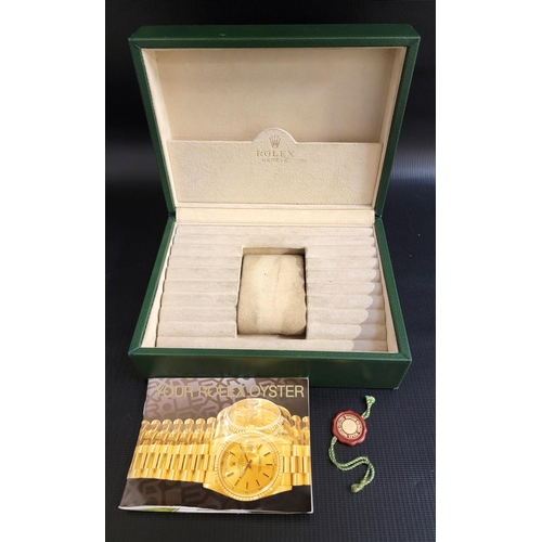 GREEN ROLEX WATCH BOX
with suede lined interior complete with central watch holder, ref 70.00.01; together with a Rolex Oyster booklet