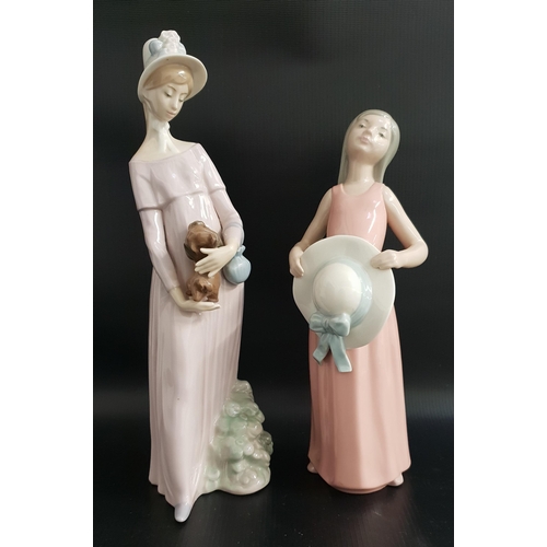 TWO LLADRO FIGURINES
comprising The Dreamer, 5008, 25cm high and My Little Pet, 4994, 29.5cm high (2)