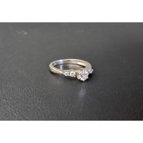 77 - GRADUATED DIAMOND FIVE STONE RING
the raised central round brilliant cut diamond approximately 0.4ct... 