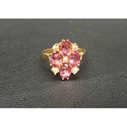 PINK TOPAZ AND SEED PEARL CLUSTER RING
the four oval cut pink topaz gemstones interspersed with five seed pearls, on a nine carat gold shank, ring size N-O