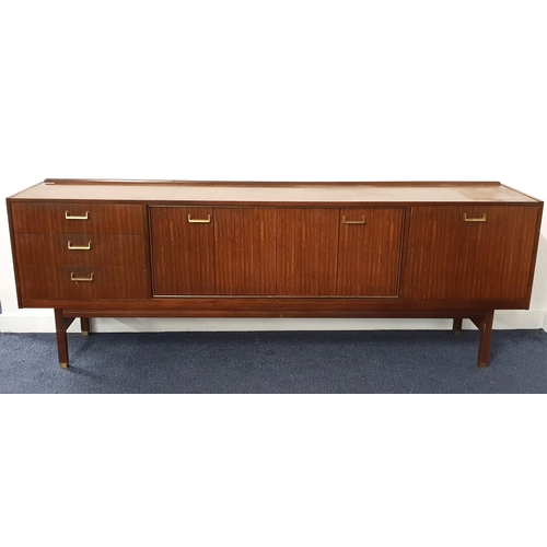 301 - 1960s TEAK SIDEBOARD
with a raised back and rectangular top above two pairs of central folding cupbo... 