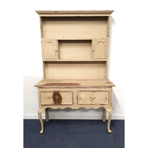 PAINTED OAK DRESSER
the upper section with three plate shelves and two panelled cupboard doors, the base with two panelled drawers above a shaped frieze, standing on cabriole supports, 203cm x 130cm