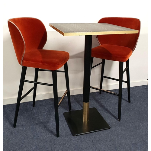 323 - BLACK ASH EFFECT HIGH BISTRO TABLE AND TWO BAR STOOLS
the table with a square top and brass effect e... 