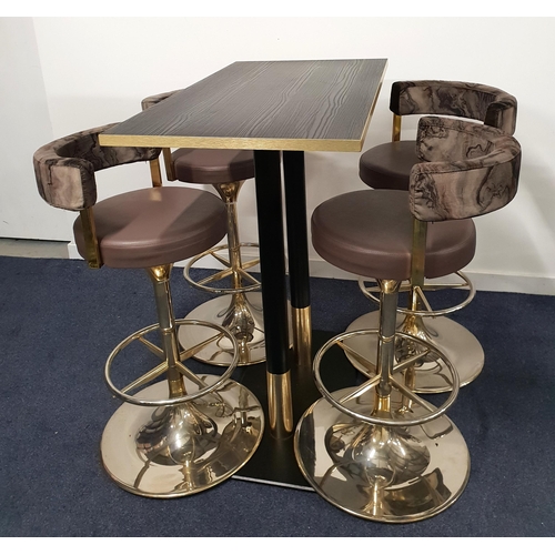 BLACK ASH EFFECT HIGH BISTRO TABLE AND FOUR SWIVEL BAR STOOLS
the table with a rectangular top and brass effect edge on two turned metal columns with brass collar and black metal weighted base, 114cm high, the top 110cm x 60cm; the swivel bar stools with foot rests and raised on circular metal bases