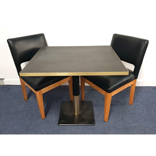 331 - BLACK ASH EFFECT TABLE AND TWO CHAIRS
the table with a rectangular top and brass effect edge on turn... 