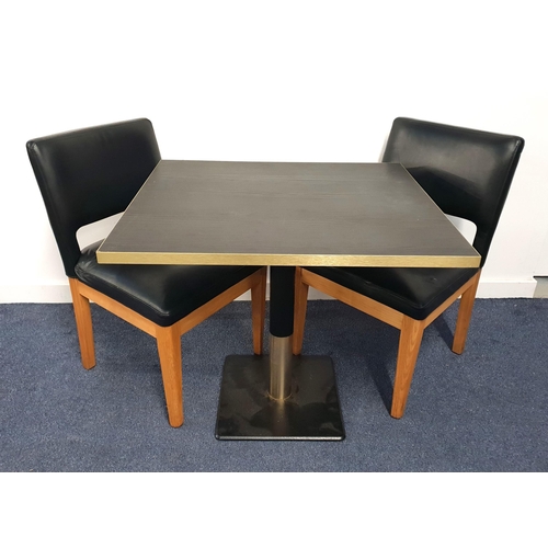 332 - BLACK ASH EFFECT TABLE AND TWO CHAIRS
the table with a rectangular top and brass effect edge on turn... 