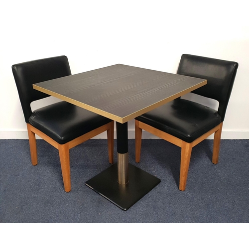 335 - BLACK ASH EFFECT TABLE AND TWO CHAIRS
the table with a square top and brass effect edge on turned me... 