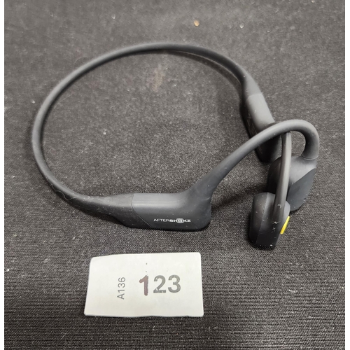 123 - PAIR OF AFTERSHOKZ AEROPLEX HEADPHONES 
model AS800, Tour De France edition