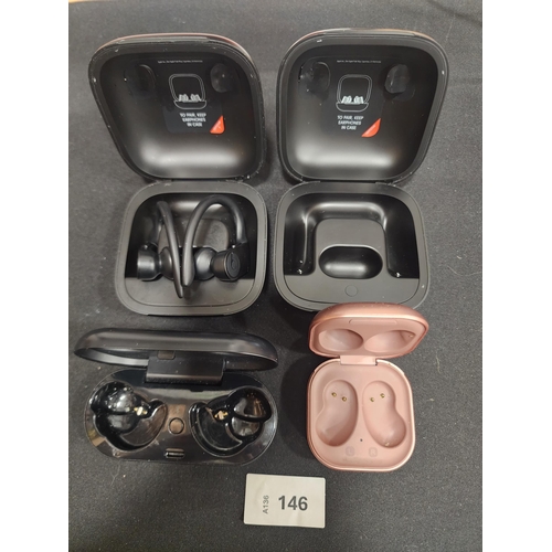 146 - FOUR EARBUD CHARGING CASES
comprising Beats, Bose and Samsung