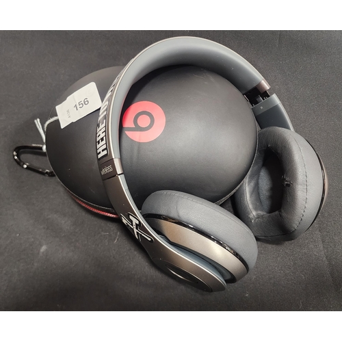 156 - PAIR OF BEATS STUDIO HEADPHONES
in Beats case
Note: wear to earbuds and stickers to headband