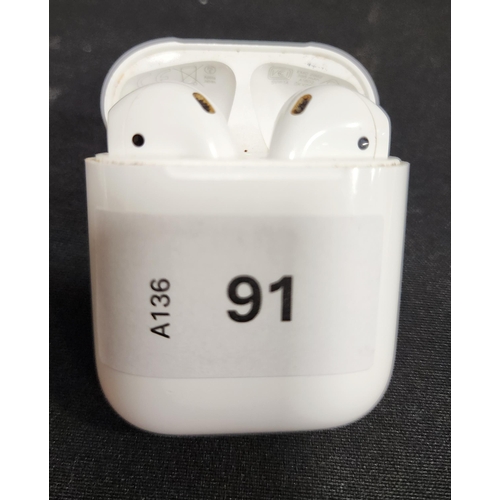 91 - PAIR OF APPLE AIRPODS 
in Lightning charging case
Note: earbuds model number not visible