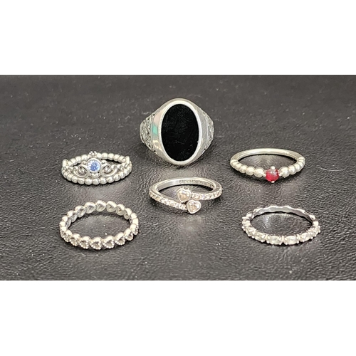 103 - SELECTION OF FASHION RINGS
comprising four Pandora silver rings - Disney Cinderella Blue Tiara, Two ... 