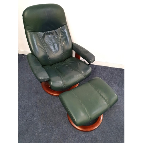EKORNES STRESSLESS ARMCHAIR
in green leather with a reclining back and rotating base, together with a matching footstool (2)